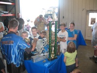 Boy Scout visit to monster truck shop. (Martial Law)